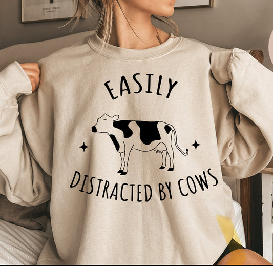 Easily Distracted by Cows